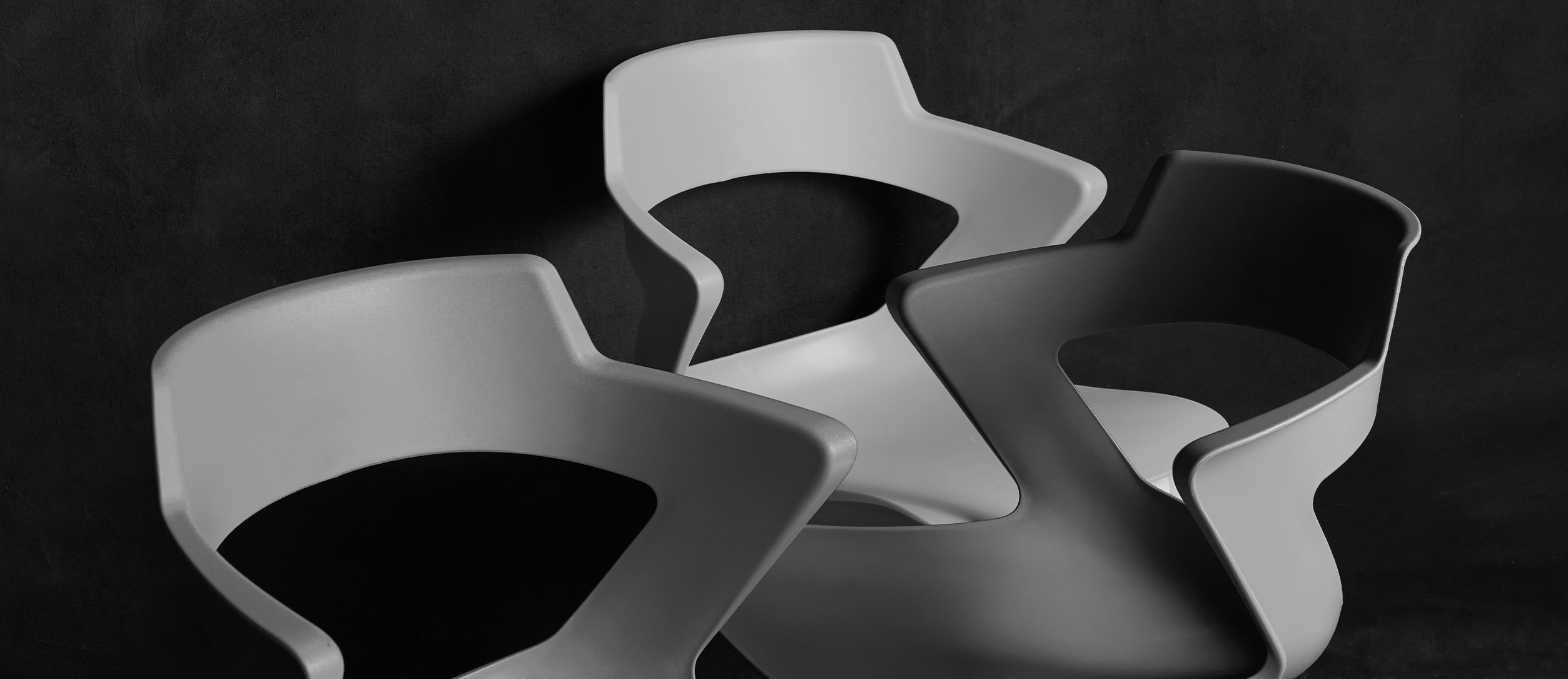 Close up of several Zee chairs by designers Grey Design Studio.