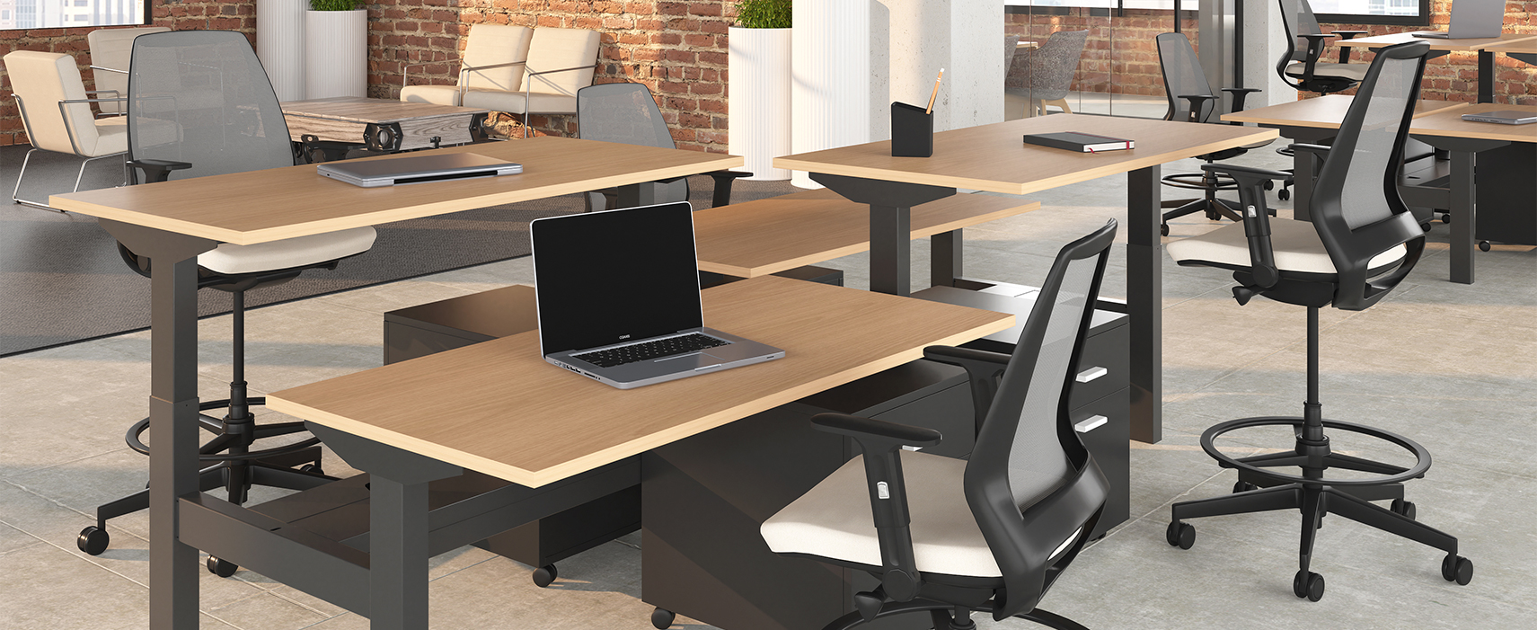 4-UP with mesh back in an open office with sit-to-stand desks.