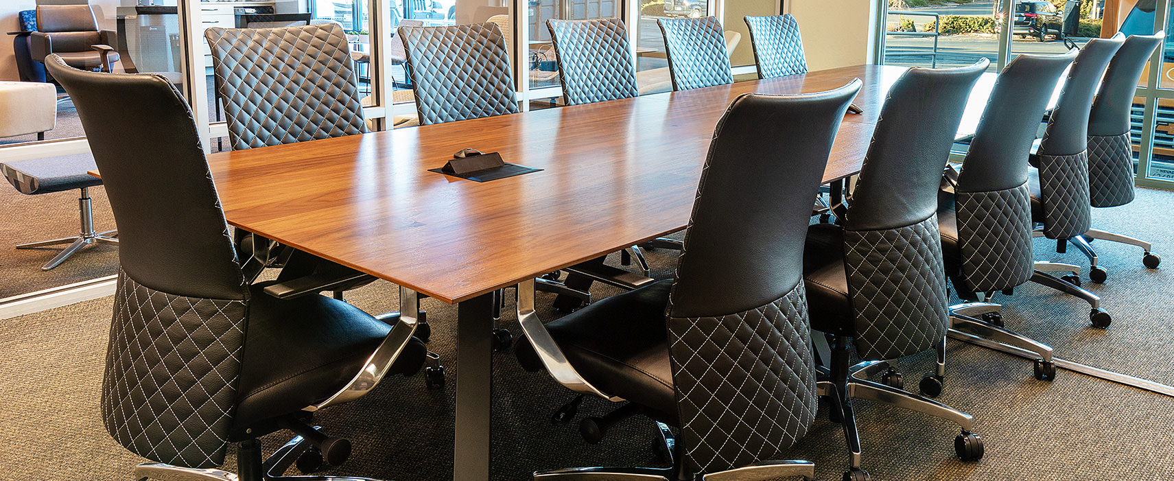 Conference chairs with diamond stitch.