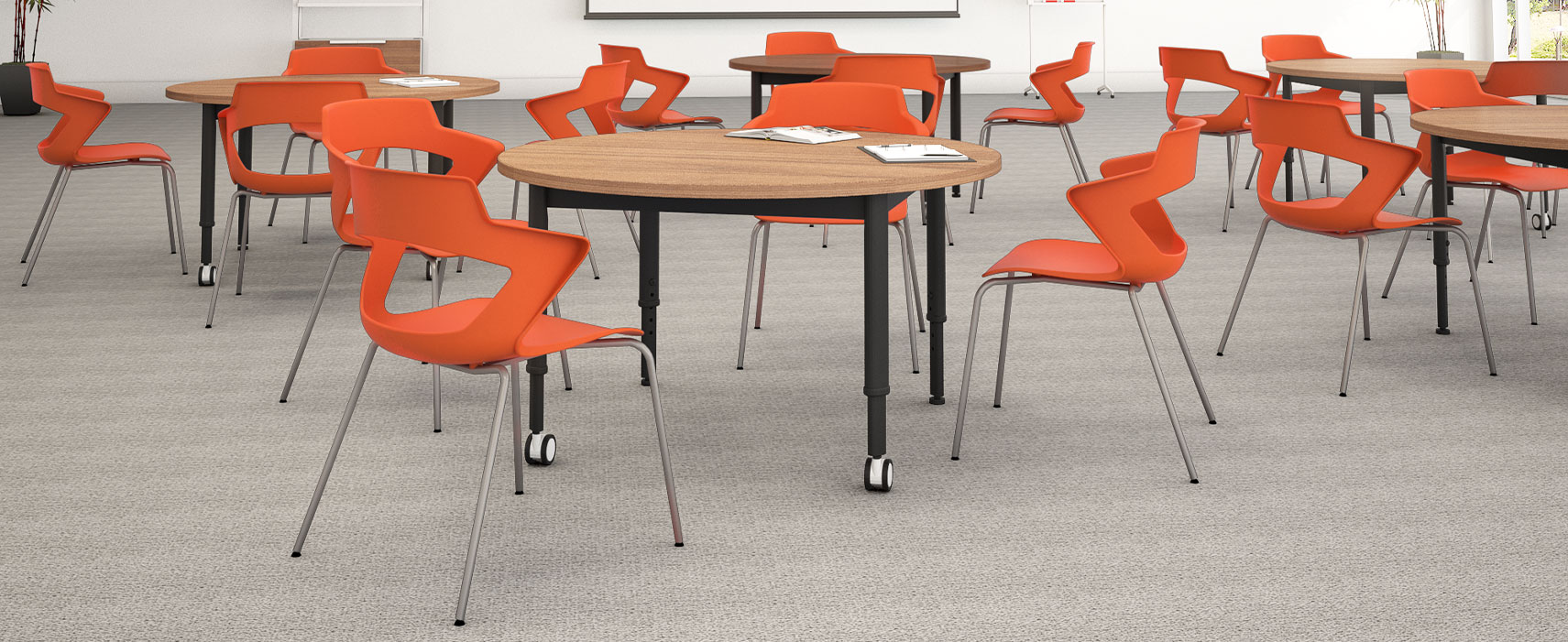 Training/Classroom featuring the Zee 4-leg chairs with orange shell.